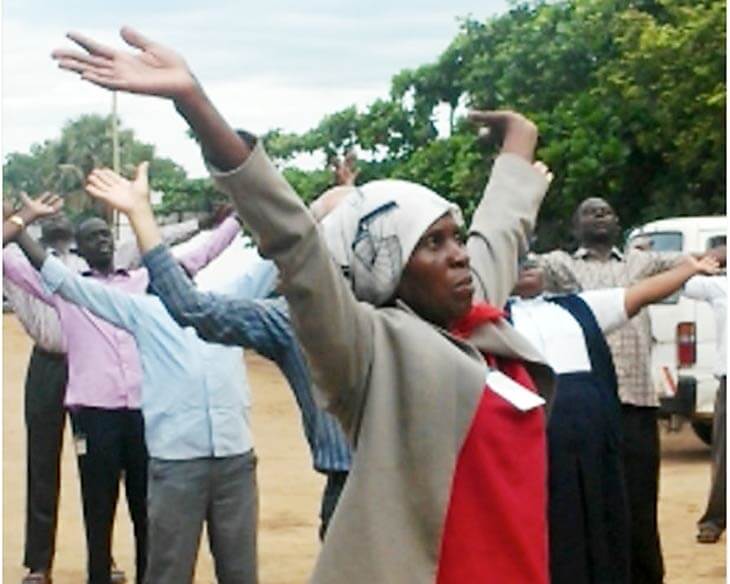 South Sudanese praying