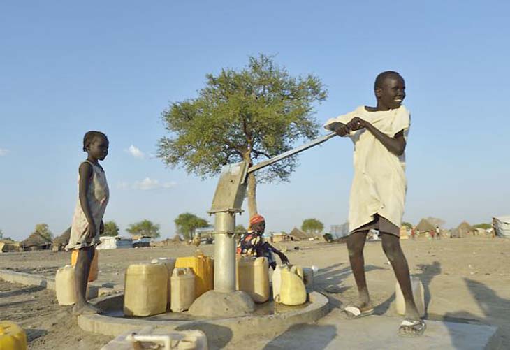 South Sudanese pumping well water